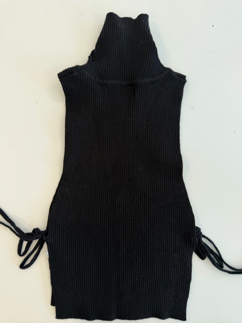 Black Cotton Ribbed Sleeveless Turtleneck with Side Tie Details